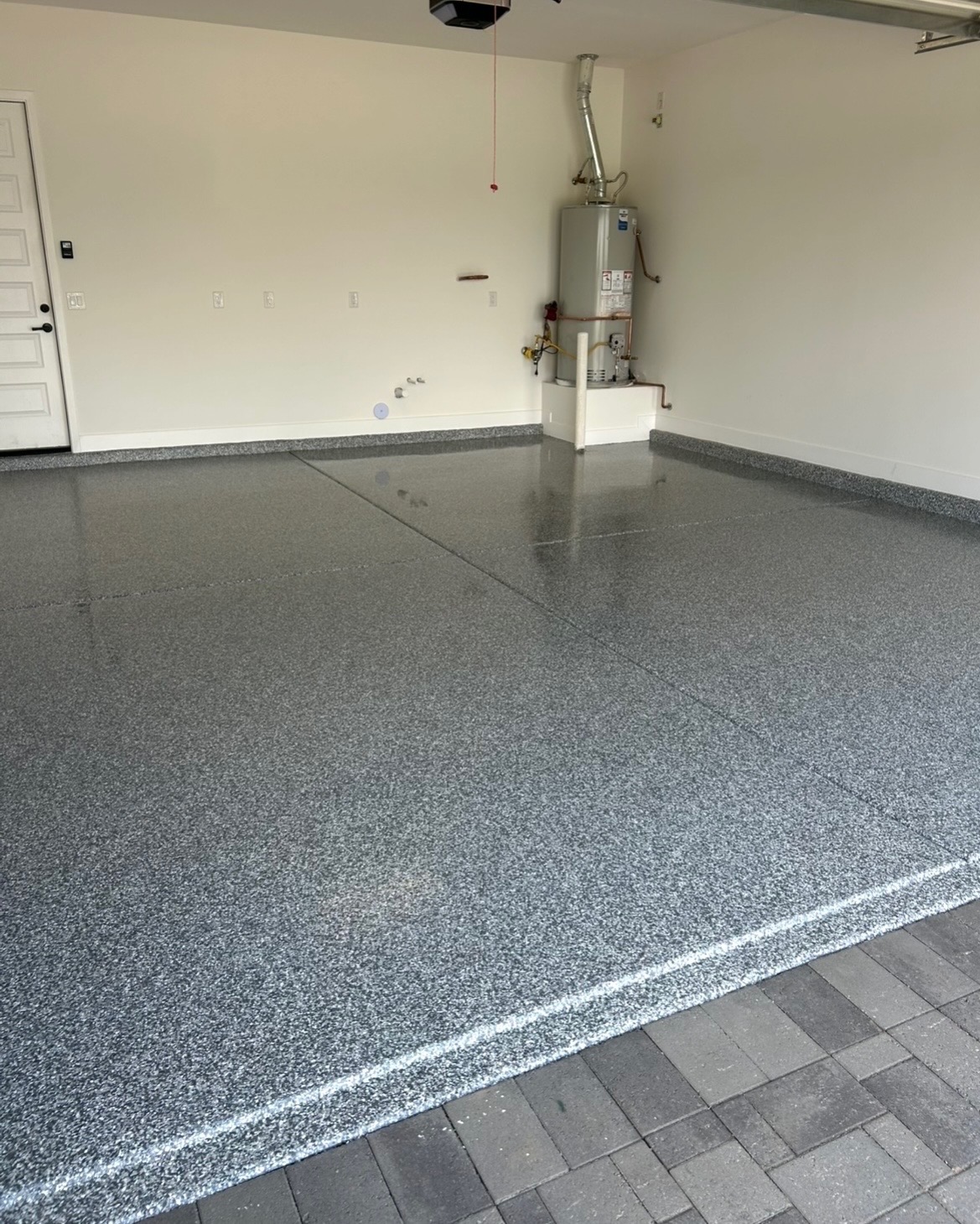 Finished garage floor coating by ACW Plus Epoxy Floors
